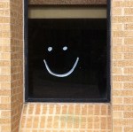 smiley face on a window